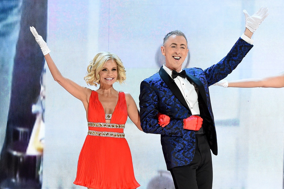 Hosts Kristin Chenoweth and Alan Cumming perform onstage at the 2015 Tony Awards.